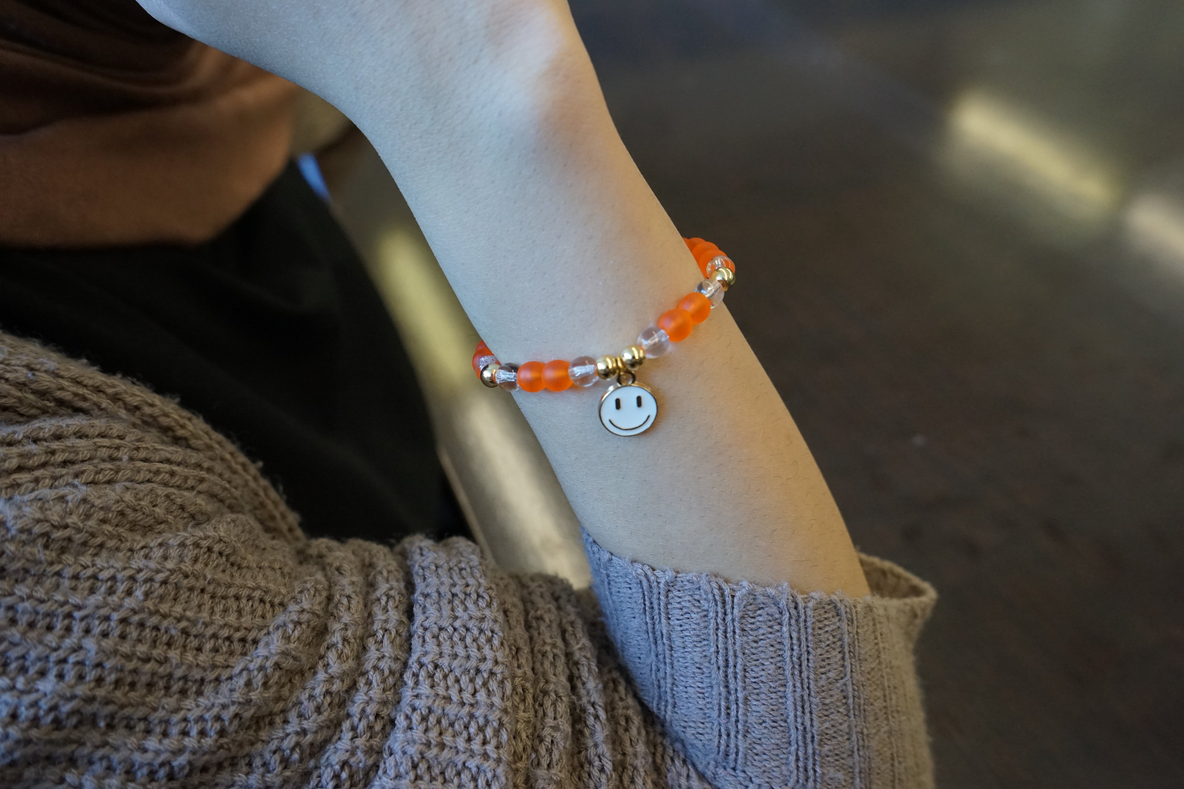 Women's Tangerine Bracelet with White Smiley Face