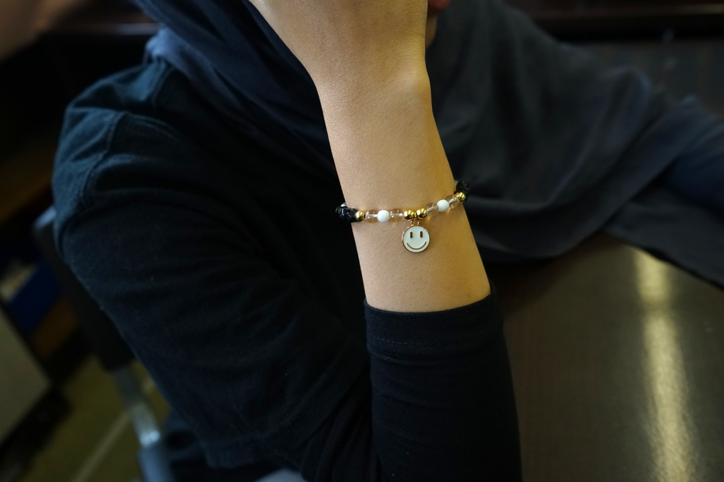 Women's Black Bracelet with White Smiley Face