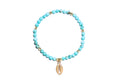 Turquoise bead with Conch Shell Charm
